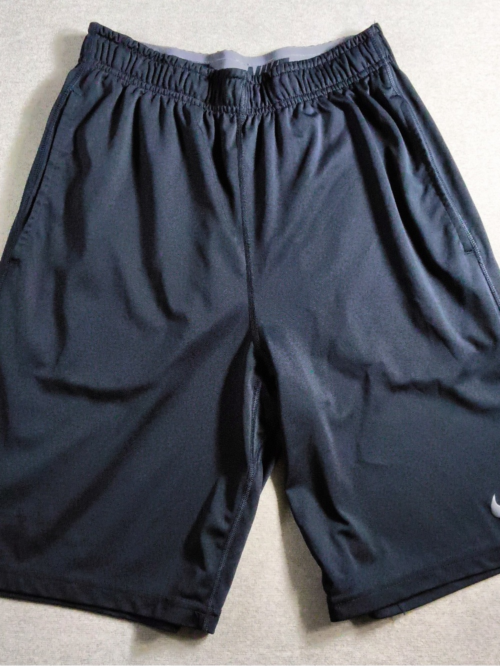 Nike Men's Black Athletic Shorts with White Swoosh